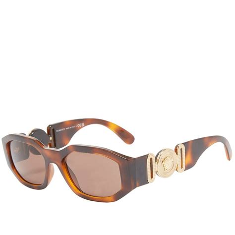 versace tortoiseshell wrapped sunglasses|Versace tortoise shell eyeglasses.